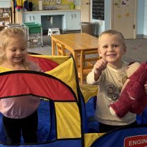 Preschool playing in bus