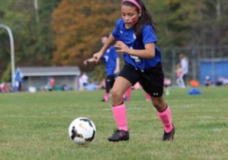 WebsiteImage_CRA_YouthSports_Travel_GrilsTravel_Soccer_GoBlue