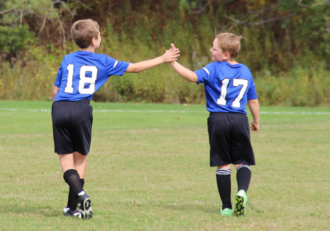 WebsiteImage_CRA_YouthSports_Travel_Soccer_TeamWork